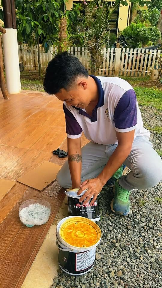 A Molino technician mixing termiticide at a customer's house before treatment